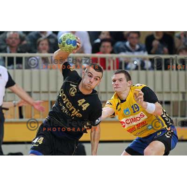 Rok Simic and Robert Konecnik in action during handball match Cimos Koper- Gorenje in MIK 1.liga, played in Bonifika Hall, koper, Slovenia 15.11.2009 