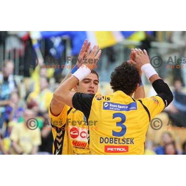 Skoko, Dobelsek in action during handball match Cimos Koper- Gorenje in MIK 1.liga, played in Bonifika Hall, koper, Slovenia 15.11.2009 