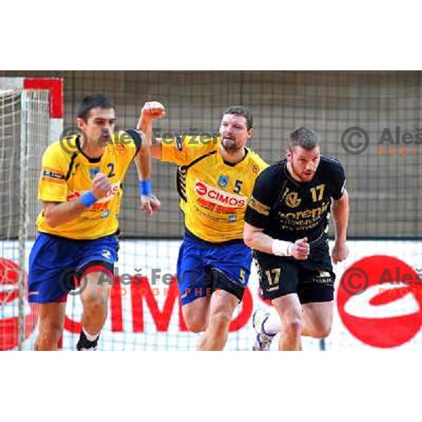 Rok Praznik, Skoko, Mlakar in action during handball match Cimos Koper- Gorenje in MIK 1.liga, played in Bonifika Hall, koper, Slovenia 15.11.2009 