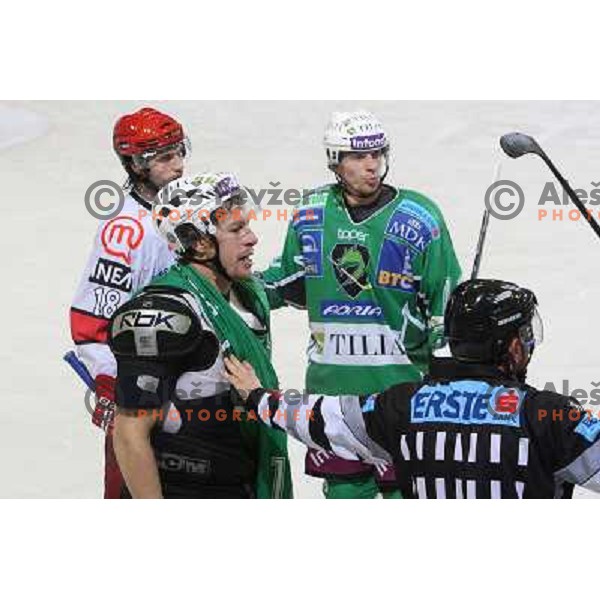 Egon Muric, Ales Music after fight during ice-hockey match Tilia Olimpija- Acroni Jesenice in Ebel league, played in Hala Tivoli, Ljubljana, Slovenia 27.11.2009 