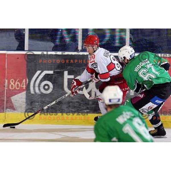 matt Higgins, Sebahudin Kovacevic in action during ice-hockey match Tilia Olimpija- Acroni Jesenice in Ebel league, played in Hala Tivoli, Ljubljana, Slovenia 27.11.2009. 