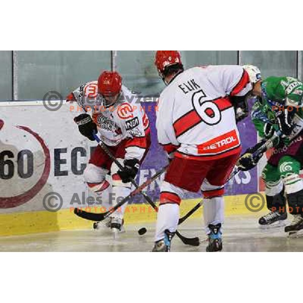 Hebar and Elik in action during ice-hockey match Tilia Olimpija- Acroni Jesenice in Ebel league, played in Hala Tivoli, Ljubljana, Slovenia 27.11.2009. 