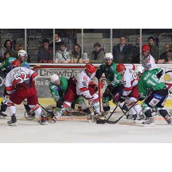 Robert Robins, Andrej Hebar, Ales Sila, Jurij Golicic,Ales Music in action during ice-hockey match Tilia Olimpija- Acroni Jesenice in Ebel league, played in Hala Tivoli, Ljubljana, Slovenia 27.11.2009. 