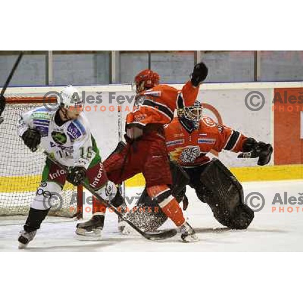 Ales Music and Grumet-Morris,Kovacevic in action during ice-hockey match Acroni Jesenice- Tilia Olimpija in Ebel league, played in Podmezakla Hall, Jesenice 4.12.2009 