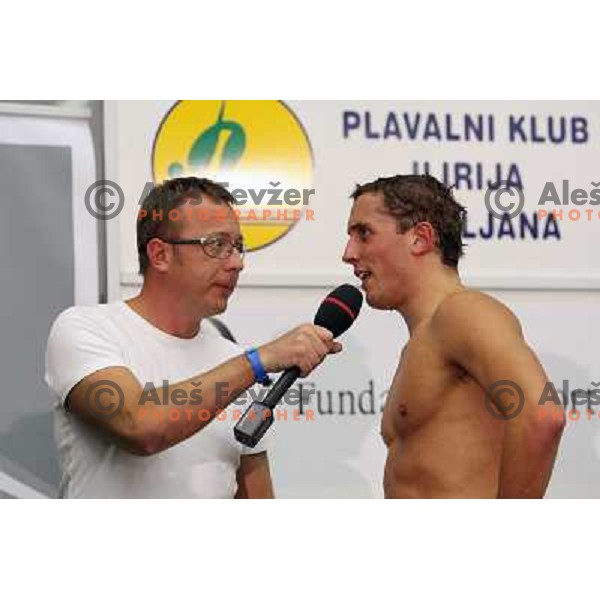 Robert Pecnik-Peco and Jason Dunford (KEN) in action during swimming competition Ilirija Challenge in Tivoli pool, Ljubljana, Slovenia 16.12.2009 
