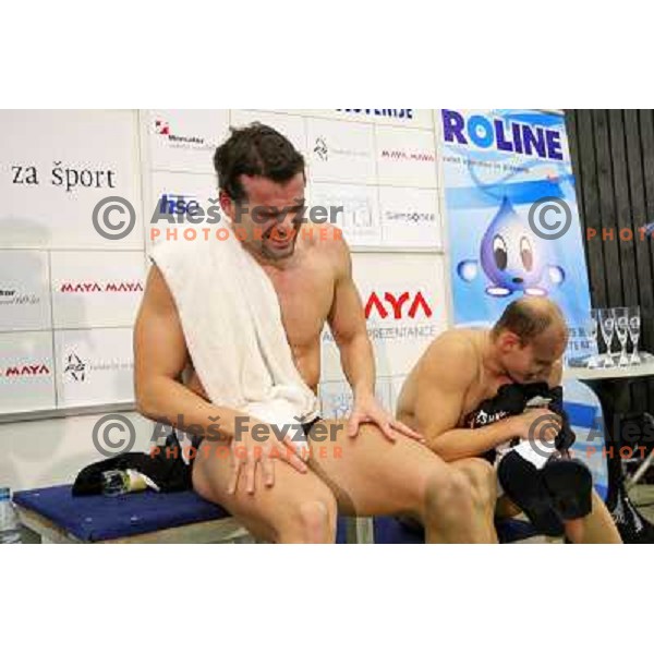 Peter Mankoc (SLO) and Evgeny Korotyshkin (RUS) after action during swimming competition Ilirija Challenge in Tivoli pool, Ljubljana, Slovenia 16.12.2009 