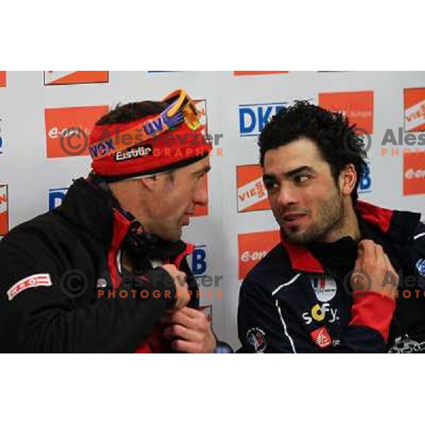 Simon Fourcade (right), Christoph Sumann in action during E-on Ruhrgas IBU Biatlon World Cup, men 20km individual, 17.12.2009, Pokljuka, Slovenia 