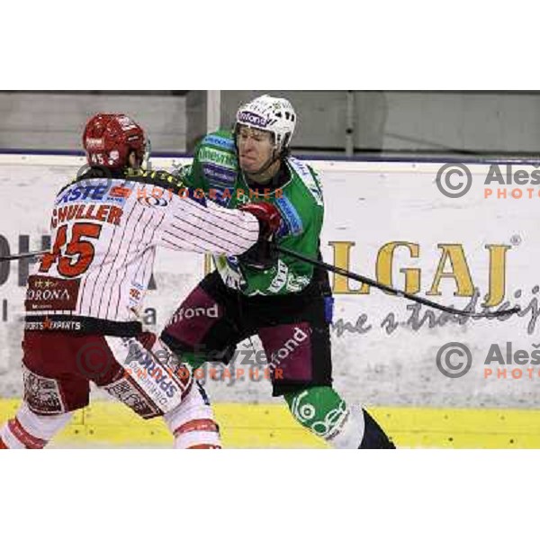 Egon Muric and Schuller in action during ice-hockey match Tilia Olimpija-KAC in Ebel league, played in Hala Tivoli, Ljubljana, Slovenia 19.1.2010 
