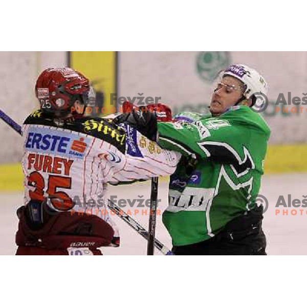 Matej Hocevar and Furey in action during ice-hockey match Tilia Olimpija-KAC in Ebel league, played in Hala Tivoli, Ljubljana, Slovenia 19.1.2010 