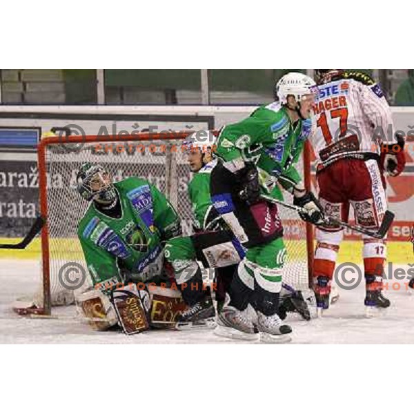 Groznik, Ales Sila, Harlan Pratt in action during ice-hockey match Tilia Olimpija-KAC in Ebel league, played in Hala Tivoli, Ljubljana, Slovenia 19.1.2010 