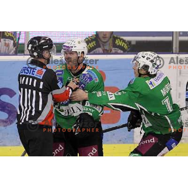 Kevin Mitchell, Egon Muric in action during ice-hockey match Tilia Olimpija-KAC in Ebel league, played in Hala Tivoli, Ljubljana, Slovenia 19.1.2010 