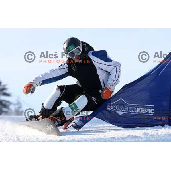 Rok Marguc, world cup snowboarder and member of Slovenia 2010 Olympic team during practice at Rogla Ski resort, Slovenia 5.1.2010 