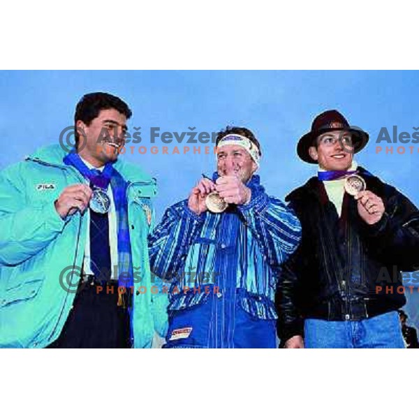 Alberto Tomba of Italy (silver medal) , Thomas Stangassinger of Austria (gold) and Jure Kosir of Slovenia with bronze olympic medal after Slalom race at Hafjell during 1994 Olympic Games in Lillehammer, Norway 