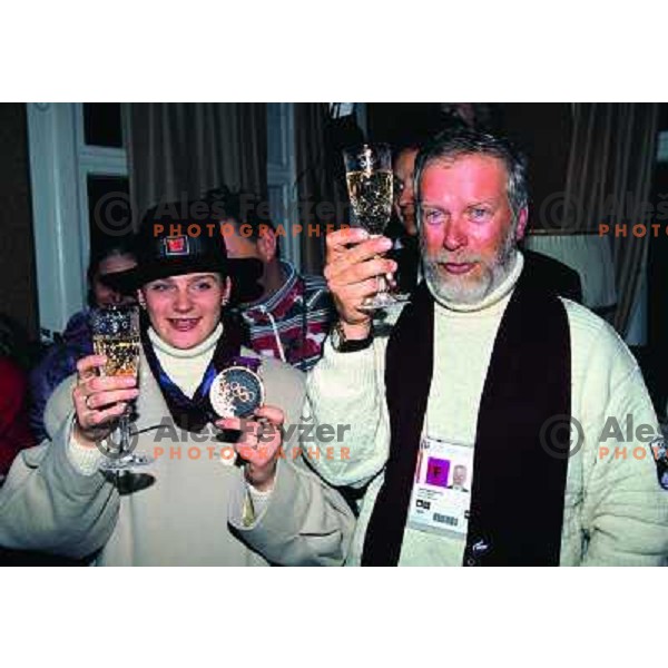 Alenka Dovzan of Slovenia with bronze Olympic medal in alpine skiing ladies combined and Jaro Kalan during reception in Slovenia house, 1994 Olympic games, Lillehammer, Norway 