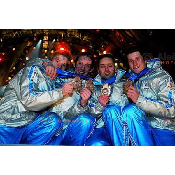 Robi Kranjec, Primoz Peterka, Damjan Fras, Peter Zonta of Slovenia showing bronze Olympic medal from team ski jumping competiton at 2002 Olympic games in Salt Lake City, USA 