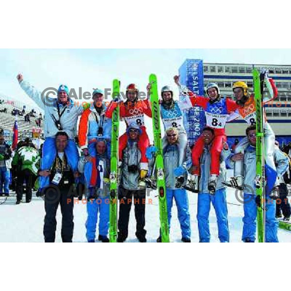 Goran Janus, Matjaz Zupan, Damjan Fras, Primoz Peterka, Peter Zonta, Robi Kranjec celebrate bronze medal in team ski jumping competition during 2002 Olympic games in Salt Lake City, USA 