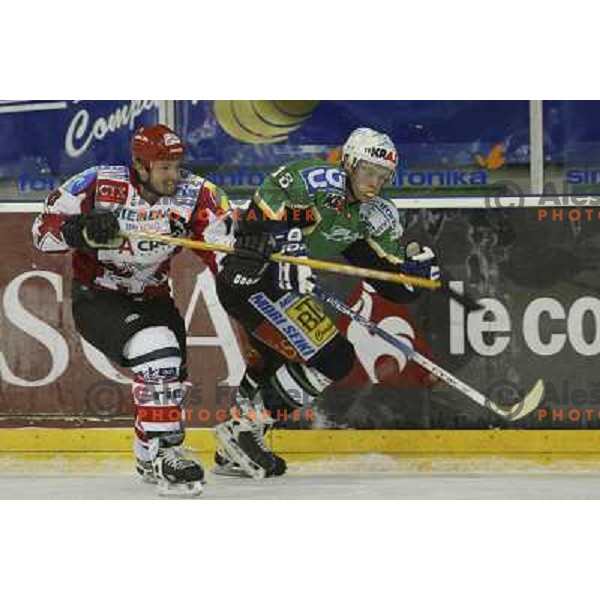 Dejan Varl, Andrej Tavzelj in action during ice-hockey match ZM Olimpija- Acroni Jesenice, played in Hala Tivoli , Ljubljana 18.9.2005 