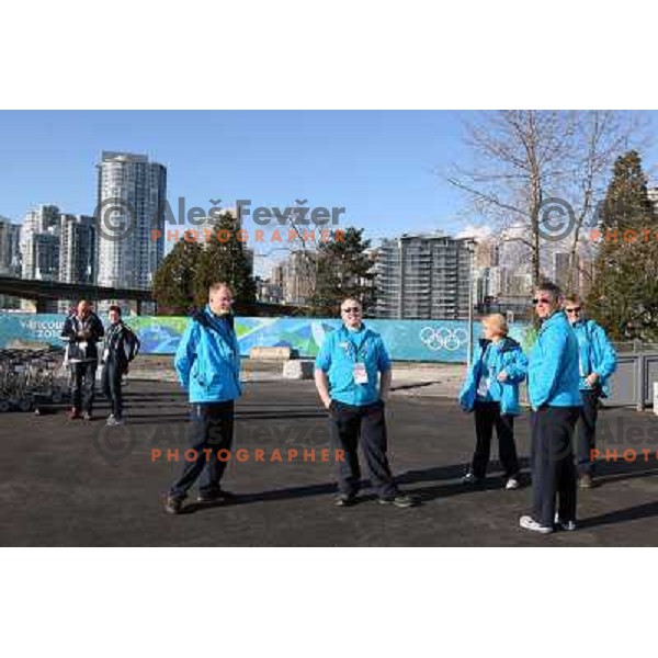 Volunteers before official ceremony "Raising the flag" in Olympic village at 2010 Winter Olympic games in Vancouver, Canada 9.2.2010 
