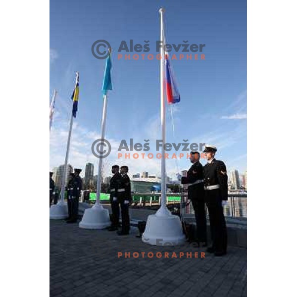 Slovenian flag on the mast during official ceremony "Raising the flag" in Olympic village at 2010 Winter Olympic games in Vancouver, Canada 9.2.2010 