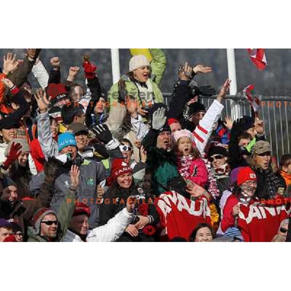 Fans cheering during qualification round in ski jumping at Normal Hill held in Whistler Olympic park, 2010 Winter Olympic games Vancouver, Canada 12.2.2010 