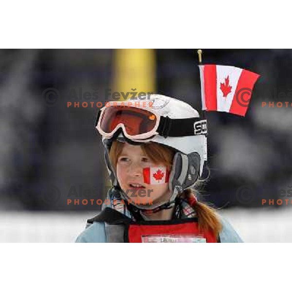 Kid watching official downhill training in Whistler Creekside 15.2.2010 at Vancouver 2010 Olympic games, Canada 