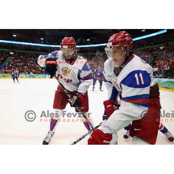 Afinogenov (61) and Malkin (11) in action during ice-hockey match Russia- Slovakia 18.2.2010 in Preliminary round, Vancouver 2010 Winter Olympic Games, Canada 