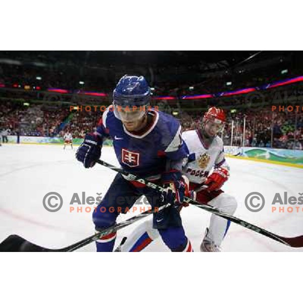  Stumpel and Zaripov in action during ice-hockey match Russia- Slovakia 18.2.2010 in Preliminary round, Vancouver 2010 Winter Olympic Games, Canada 