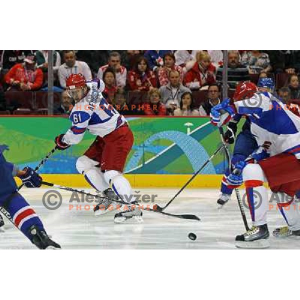 Afinogenov (61) and Malkin (11) in action during ice-hockey match Russia- Slovakia 18.2.2010 in Preliminary round, Vancouver 2010 Winter Olympic Games, Canada 