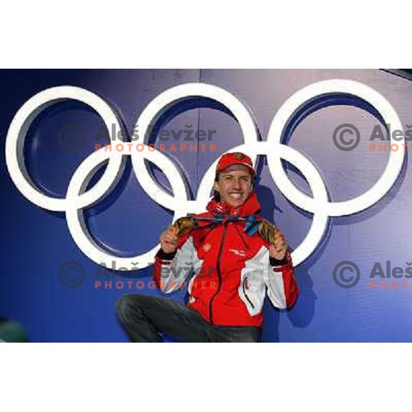 Simon Ammann (SUI) showing two gold medals from ski jumping competition at Normal and Large Hill in Whistler Olympic park during Vancouver 2010 Winter Olympic Games, Canada 