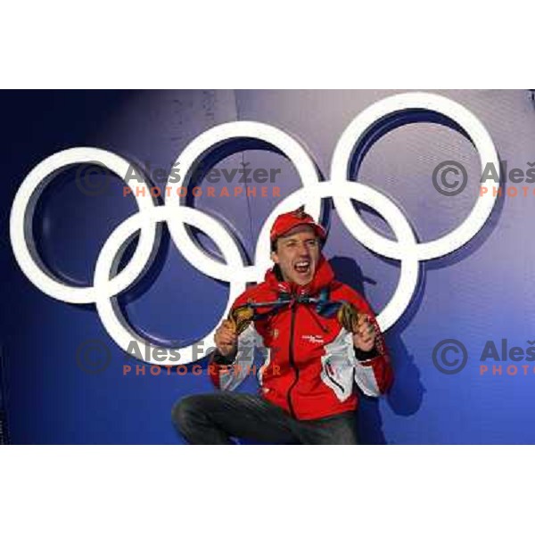 Simon Ammann (SUI) showing two gold medals from ski jumping competition at Normal and Large Hill in Whistler Olympic park during Vancouver 2010 Winter Olympic Games, Canada 