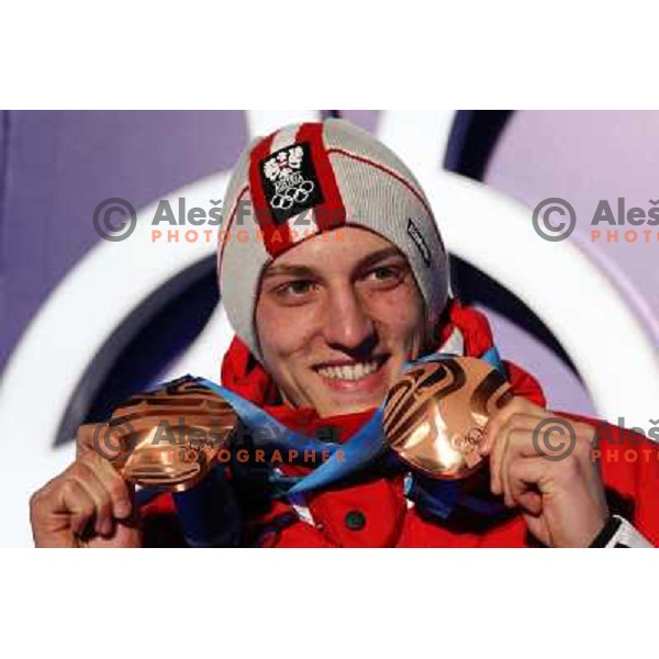 Gregor Schlierenzauer (AUT) showing two bronze medals from ski jumping competition at Normal and Large Hill in Whistler Olympic park during Vancouver 2010 Winter Olympic Games, Canada 