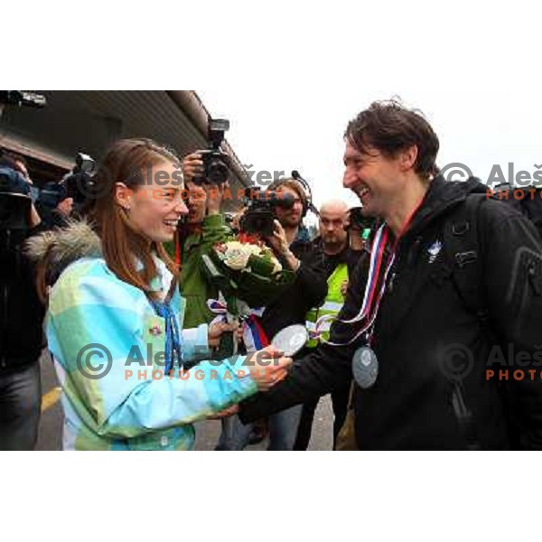 Tina Maze, two times silver medalist in Alpine skiing from Winter Olympic Games in Vancouver, and Andrea Massi during reception at Airport Joze Pucnik, Brnik, Slovenia 28.2.2010 