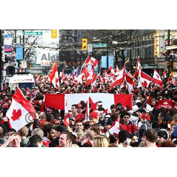 Celebration parade in downtown Vancouver after Canada Ice hockey team beat USA and won gold medal 28.2.2010, Vancouver 2010 Winter Olympic Games, Canada 