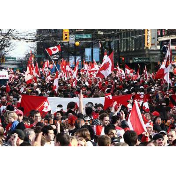 Celebration parade in downtown Vancouver after Canada Ice hockey team beat USA and won gold medal 28.2.2010, Vancouver 2010 Winter Olympic Games, Canada 