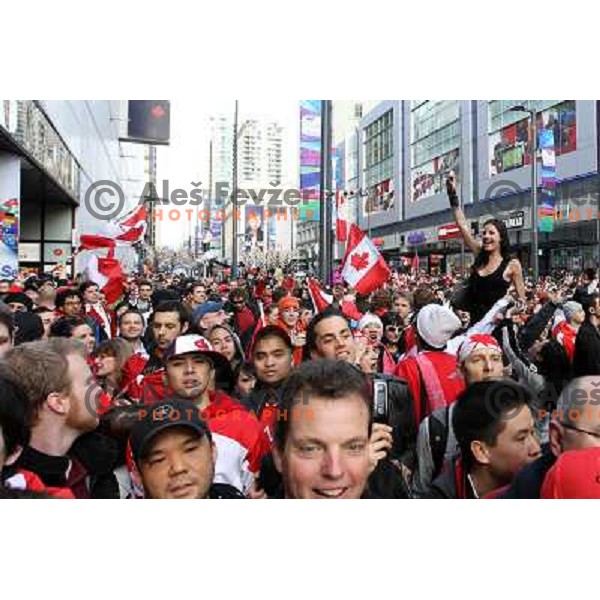 Celebration parade in downtown Vancouver after Canada Ice hockey team beat USA and won gold medal 28.2.2010, Vancouver 2010 Winter Olympic Games, Canada 