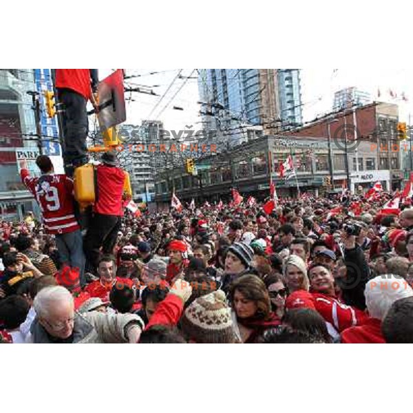Celebration parade in downtown Vancouver after Canada Ice hockey team beat USA and won gold medal 28.2.2010, Vancouver 2010 Winter Olympic Games, Canada 