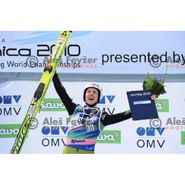 Ammann (SUI) during flower ceremony of world cup ski jumping, 20.3.2010, Planica 