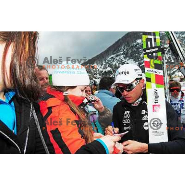  Damjan (SLO) gives autogram to fan at Planica team world cup ski jumping 