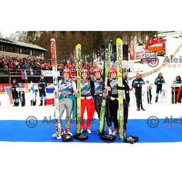 Finland team shows bronze medals after medal ceremony at team world cup ski jumping at Planica 2010 