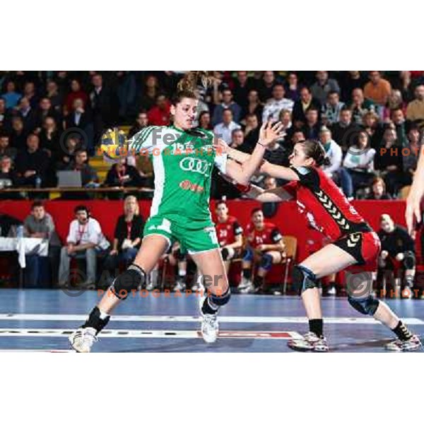 Eduarda Amorim and Alja Jankovic in action during handball match Krim Mercator- Gyor Audi Eto KC in women\'s Championsleague, played at Kodeljevo hall, Ljubljana, Slovenia 13.3.2010 