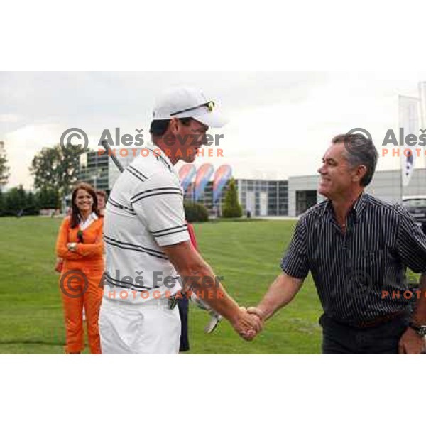 Matjaz Gojcic shake hands with his father after Dobro Jutro Zlatarna Celje invitational golf tournament at Golf Course Ptuj, Slovenia 1.6.2007 