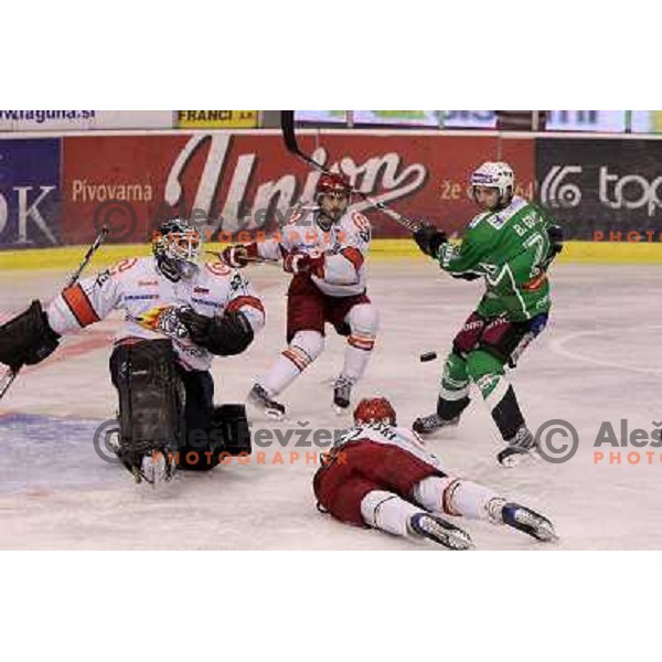 Dov grumet-Morris, Bostjan Golicic in action during ice-hockey match Tilia Olimpija- Acroni Jesenice in sixth game of Final of Slovenian hockey league, played in Hala Tivoli, Ljubljana, Slovenia 2.4.2010. 