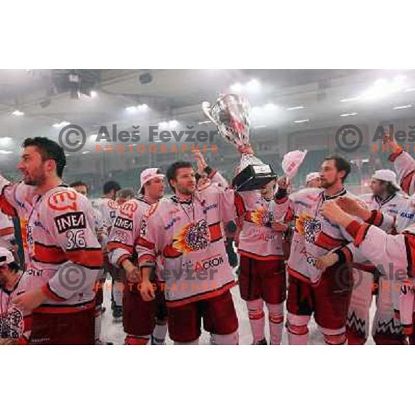  Acroni Jesenice players celebrate National ice hockey title after sixth game of Final of Slovenian hockey league between Tilia Olimpija and Acroni Jesenice, played in Hala Tivoli, Ljubljana, Slovenia 2.4.2010. Acroni Jesenice won the series 4:2 and beca