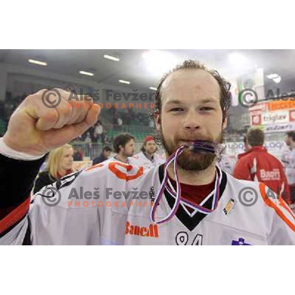 Andrej Hebar celebrates National ice hockey title after sixth game of Final of Slovenian hockey league between Tilia Olimpija and Acroni Jesenice, played in Hala Tivoli, Ljubljana, Slovenia 2.4.2010. Acroni Jesenice won the series 4:2 and became Slovenian