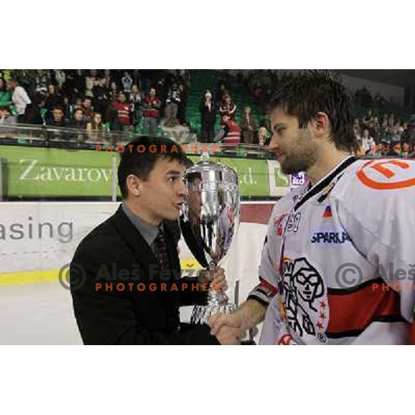 Sodrznik and Tom Hafner with National ice hockey league Cup between Tilia Olimpija and Acroni Jesenice, played in Hala Tivoli, Ljubljana, Slovenia 2.4.2010. Acroni Jesenice won the series 4:2 and became Slovenian Champions 
