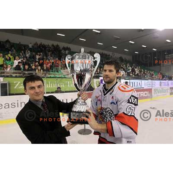 Sodrznik and Tom Hafner with National ice hockey league Cup between Tilia Olimpija and Acroni Jesenice, played in Hala Tivoli, Ljubljana, Slovenia 2.4.2010. Acroni Jesenice won the series 4:2 and became Slovenian Champions 