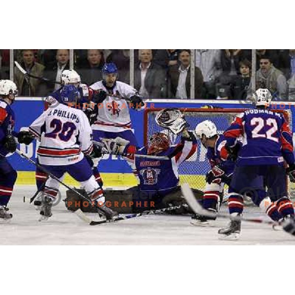 Kevin Phillips scores third goal for GB past Andrej Hocevar during ice-hockey match Slovenia- Great Britain in IIHF World Championship Divison 1 group B, played in Hala Tivoli, Ljubljana, Slovenia 20.4.2010 