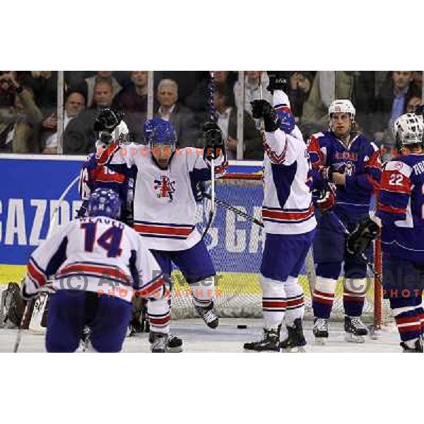 Kevin Phillips scores third goal for GB past Andrej Hocevar during ice-hockey match Slovenia- Great Britain in IIHF World Championship Divison 1 group B, played in Hala Tivoli, Ljubljana, Slovenia 20.4.2010 