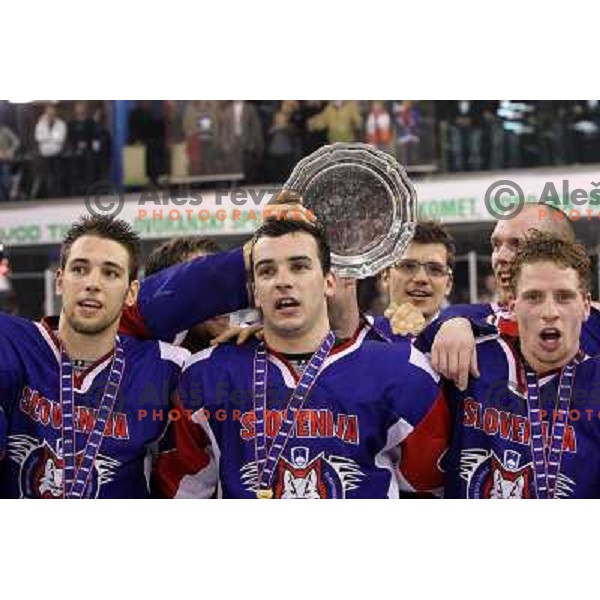 Ziga Pance, Bostjan Golicic, Ales Music during victory celebration of Slovenia team after gold medal ice-hockey match Slovenia-Hungary at IIHF World Championship-Div 1, group B, played in Hala Tivoli, Ljubljana, Slovenia 23.4.2010. Slovenia won 4-1 and to