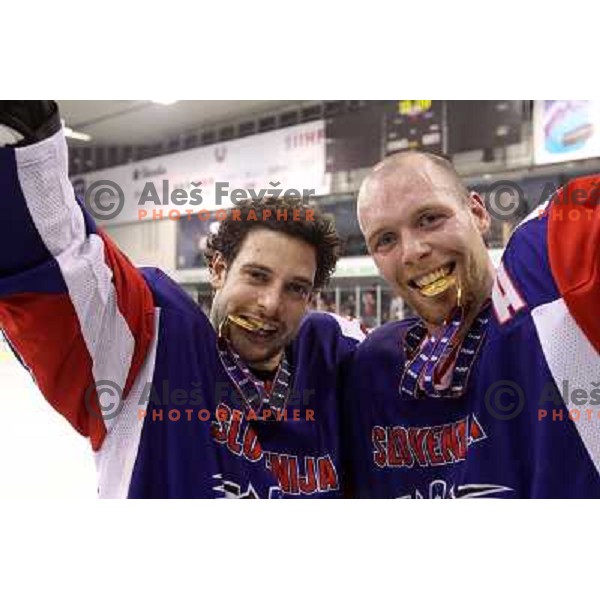 Jakob Milovanovic and Andrej Tavzelj during victory celebration of Slovenia team after gold medal ice-hockey match Slovenia-Hungary at IIHF World Championship-Div 1, group B, played in Hala Tivoli, Ljubljana, Slovenia 23.4.2010. Slovenia won 4-1 and took 